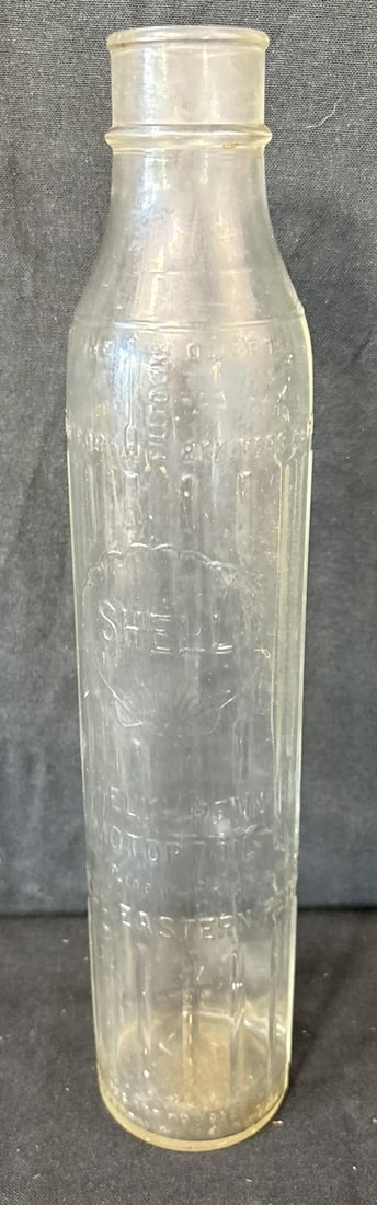 Shell Penn Embossed Glass 1 Quart Motor Oil Bottle: Great original graphics. Wear as shown. See all photos for a better idea on condition.