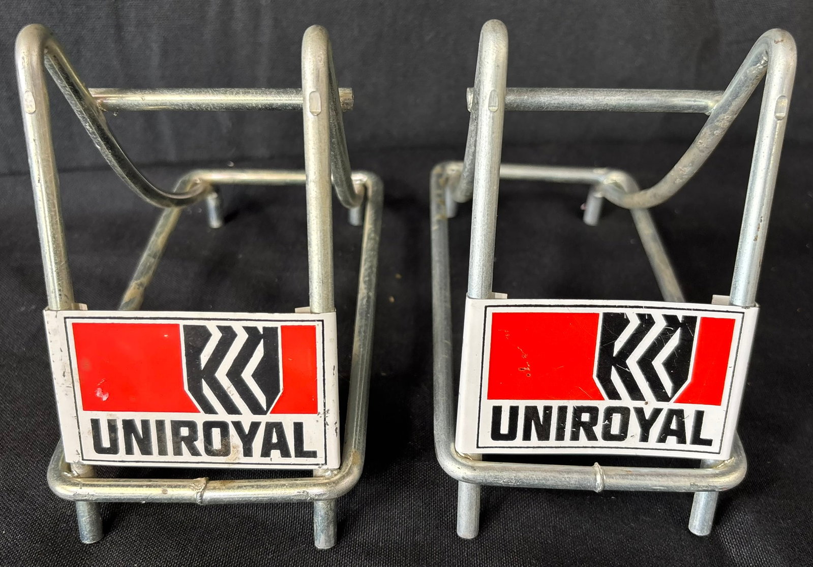 Pair Uniroyal Metal Advertising Store Display Tire Racks: Great original graphics. Wear as shown. See all photos for a better idea on condition.
