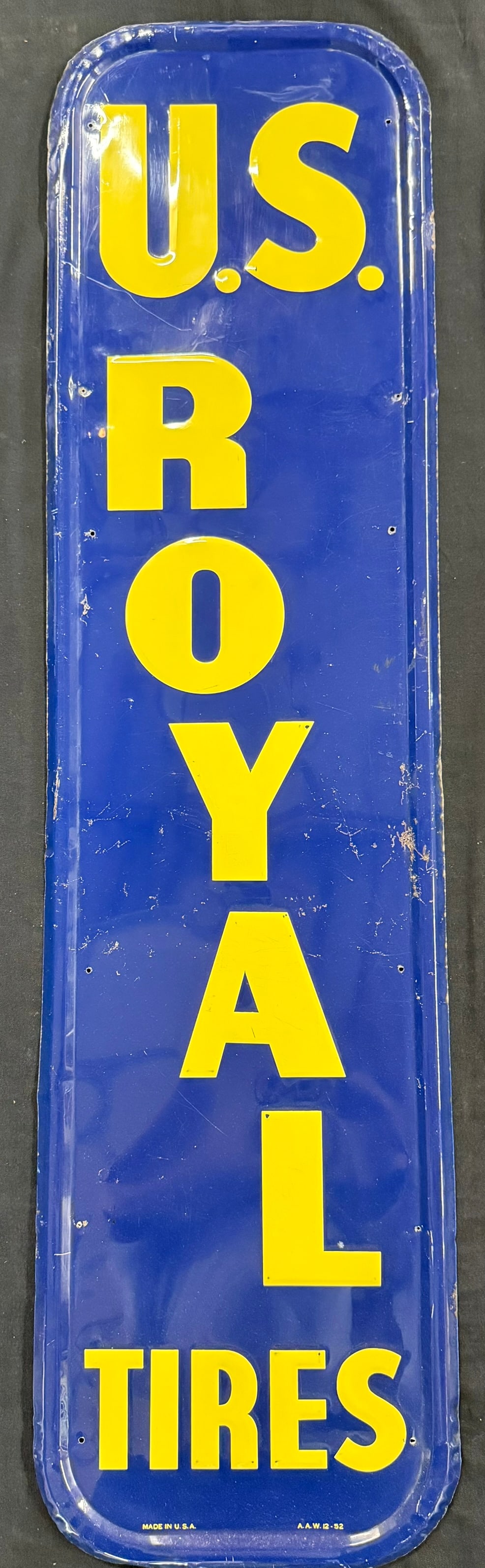 US Royal Tires Embossed 1952 Metal Vertical Advertising Sign: Nice original sign marked Made in USA. A.A.W. 12-52