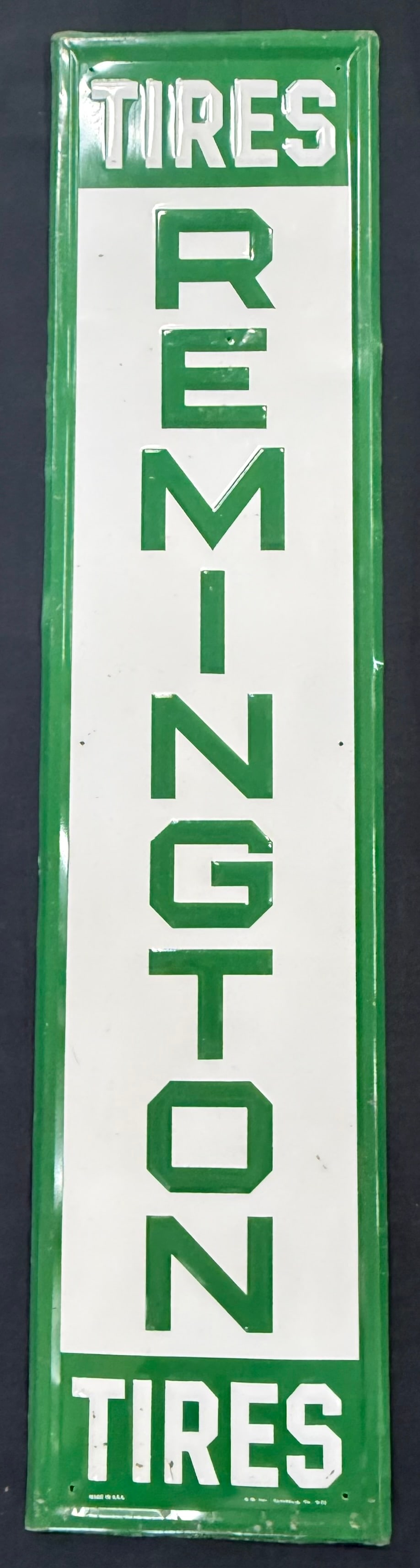 Remington Tires Embossed Metal Vertical Advertising Sign: A-M, Inc. Lynchburg, VA 9-72 - measures 60" x 13.5" - See all photos.