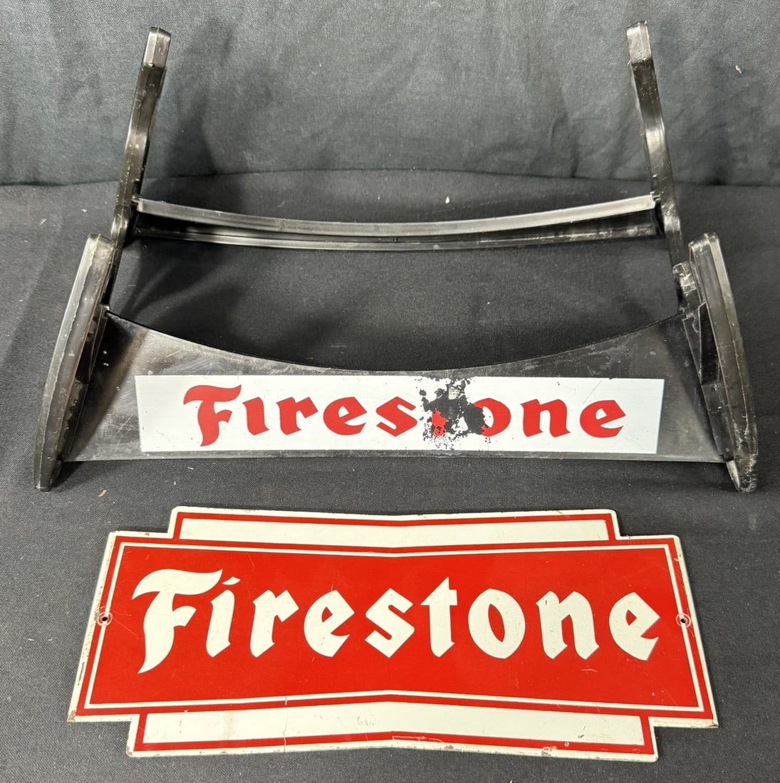 Pair Firestone Gas Service Station Plastic & Metal Tire Rack: Great original graphics. Wear as shown. See all photos for a better idea on condition.