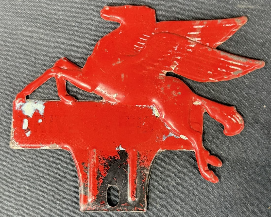 Drive Safely Embossed Mobil Pegasus License Plate Topper Sign: Great original graphics. Wear as shown. See all photos for a better idea on condition.