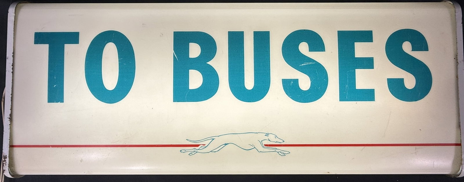 1960s Greyhound "To Buses" Plastic Lighted Sign by NPI: Measures 25" wide x 10" tall - marked NPI as shown - works great - no cracks or breaks that are noticeable.