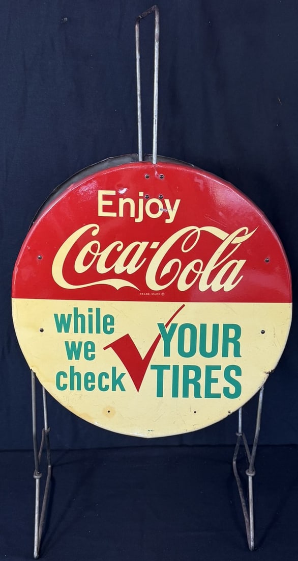Enjoy Coca Cola While We Check Tires Tin Tire Display Rack: Marked AM 42 - this sign was produced April of 1962. Sign is 24" diameter and overall 32" tall