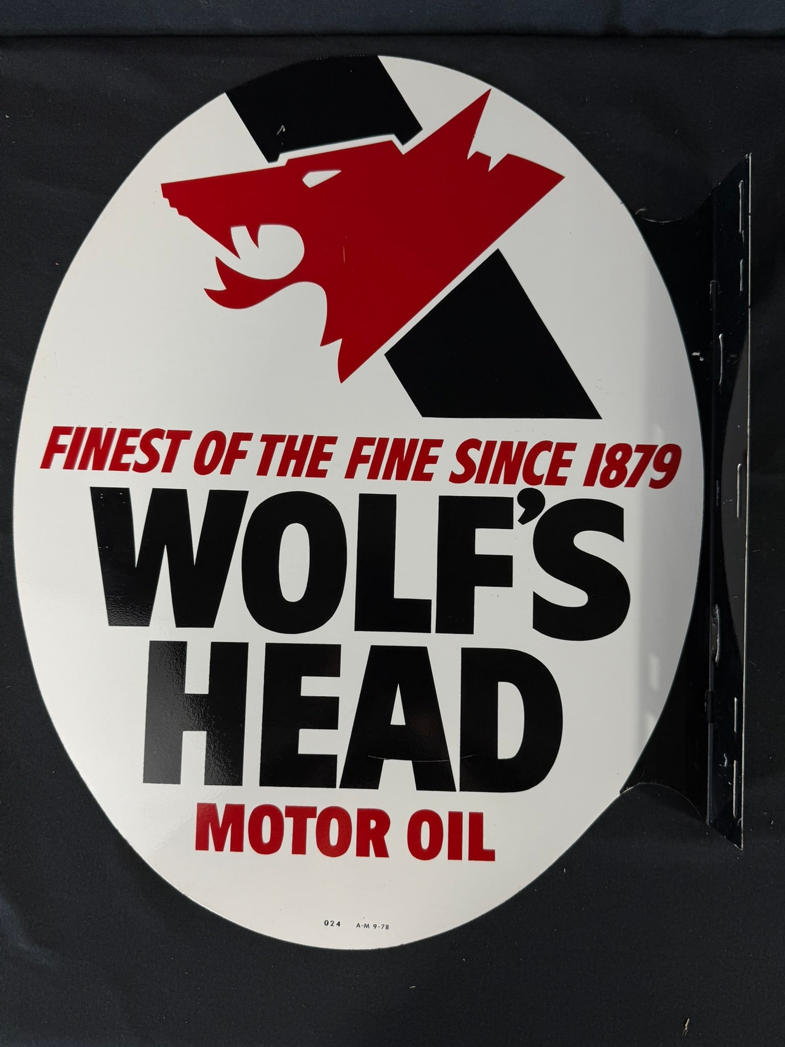 1978 Wolf's Head Motor Oil DST Painted Metal Flange Sign: Mark 024 & AM 9-78 - light surface scratches overall. Measures 22" x 17" overall