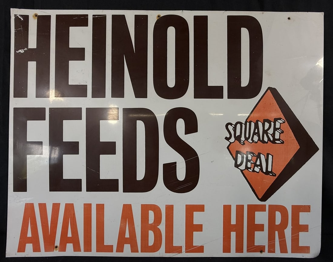 Heinold Feeds Square Deal Available Here SST Metal Sign: Measures 28" x 22"