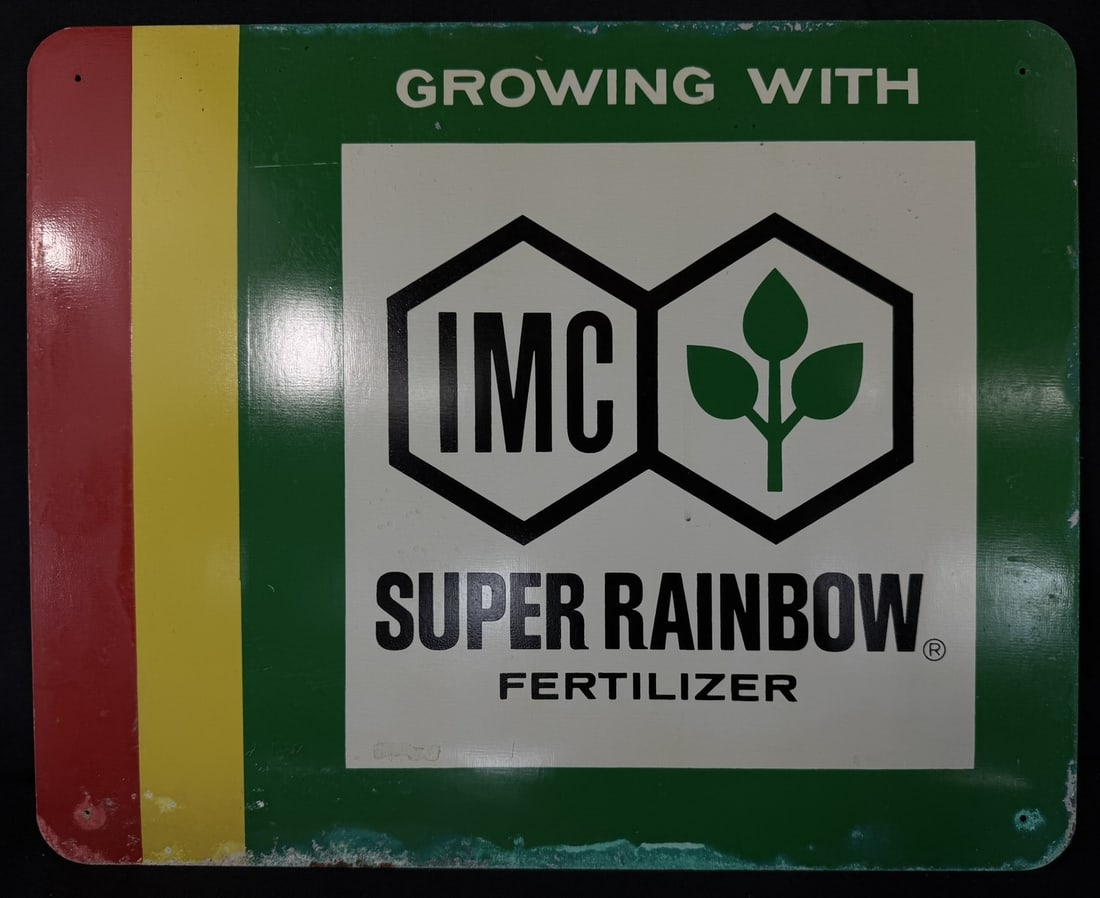 Growing With IMC Super Rainbow Fertilizer SST Tin Sign: 19.75" wide