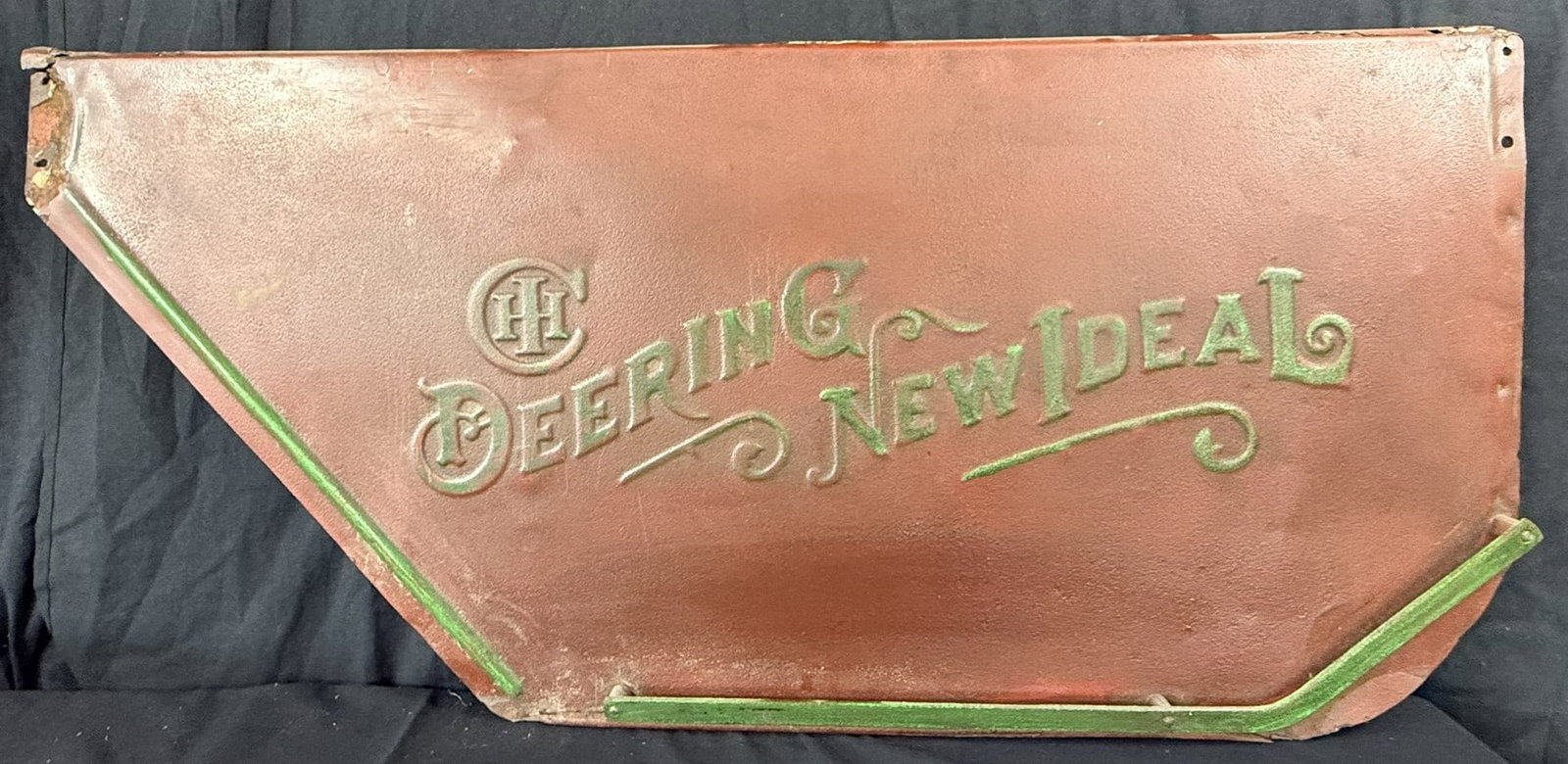 International Harvester Deering New Ideal Embossed Farm Sign: Great original paint. Roughly 47" x 22"