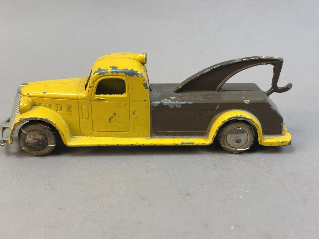 Tootsie Toy Yellow Brown 5.5" Wrecker Toy Truck: Please make sure you view all photos and ask any questions you may have! Great original collectible item. This is day 1 of our 2 day one owner auction event. Thanks and have a great day! Holler & Hamm