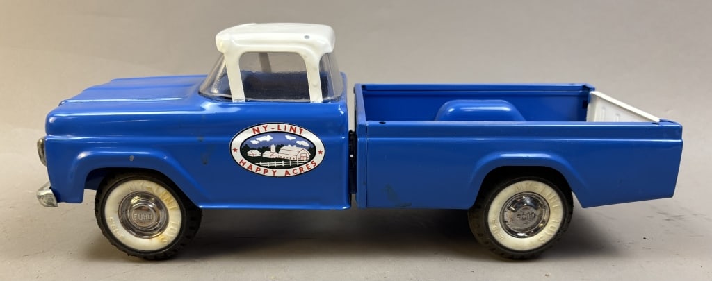 Nylint Pressed Steel Blue Single Cab Ford Pickup: Truck appears to be repainted with new NY-LINT Happy Acres Decals applied! Please make sure you view all photos and ask any questions you may have! Great original collectible item. This is day 1 of ou
