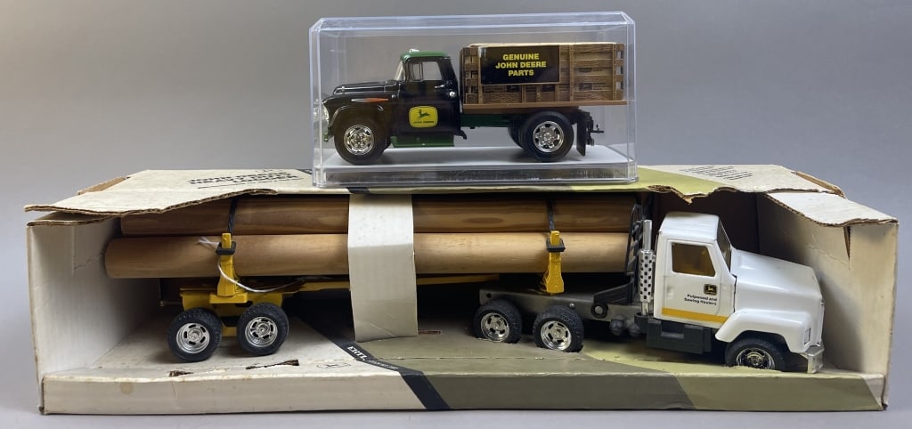 Ertl John Deere Log Hauler & Chevy Stake Truck: Please make sure you view all photos and ask any questions you may have! Great original collectible item. This is day 1 of our 2 day one owner auction event. Thanks and have a great day! Holler &