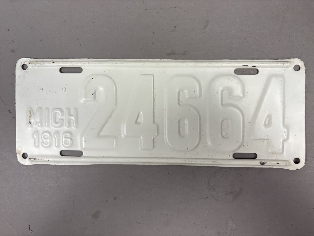 1916 Michigan 24664 Repainted License Plate: See all photos as a better idea of condition.