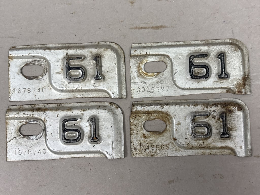 Lot of 4 1961 Michigan License Plate Renewal Tags: See all photos as a better idea of condition.