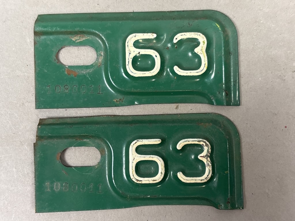 Pair 1963 Michigan License Plate Renewal Tags: See all photos as a better idea of condition.