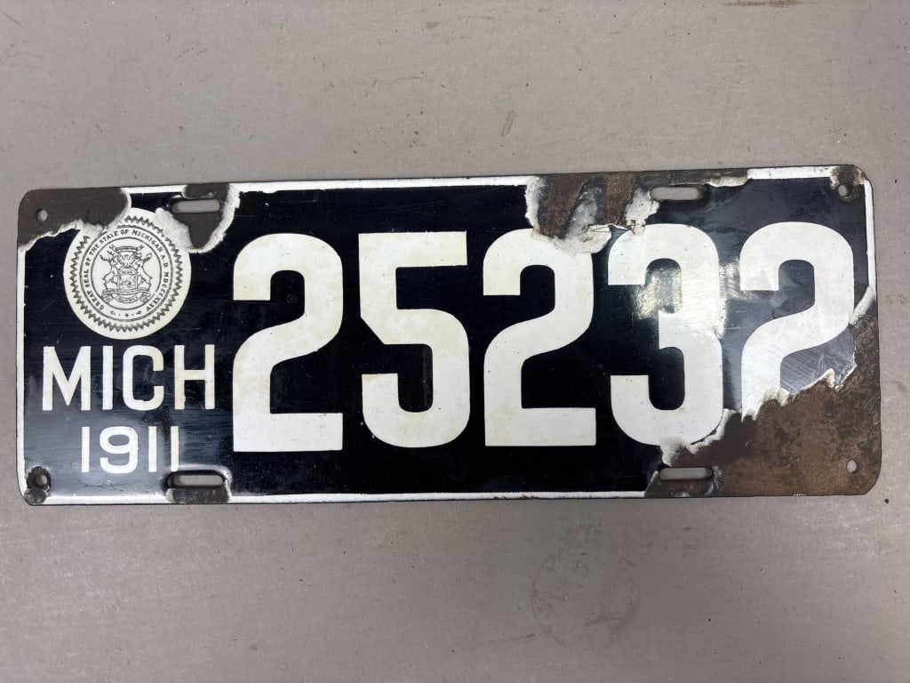 1911 Michigan 25232 Porcelain License Plate: See all photos as a better idea of condition.