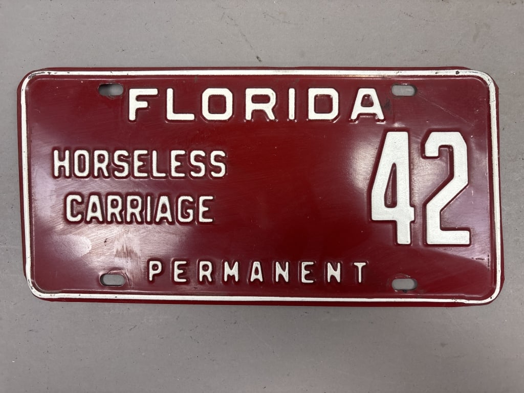 Florida Permanent Horseless Carriage License Plate: See all photos as a better idea of condition.