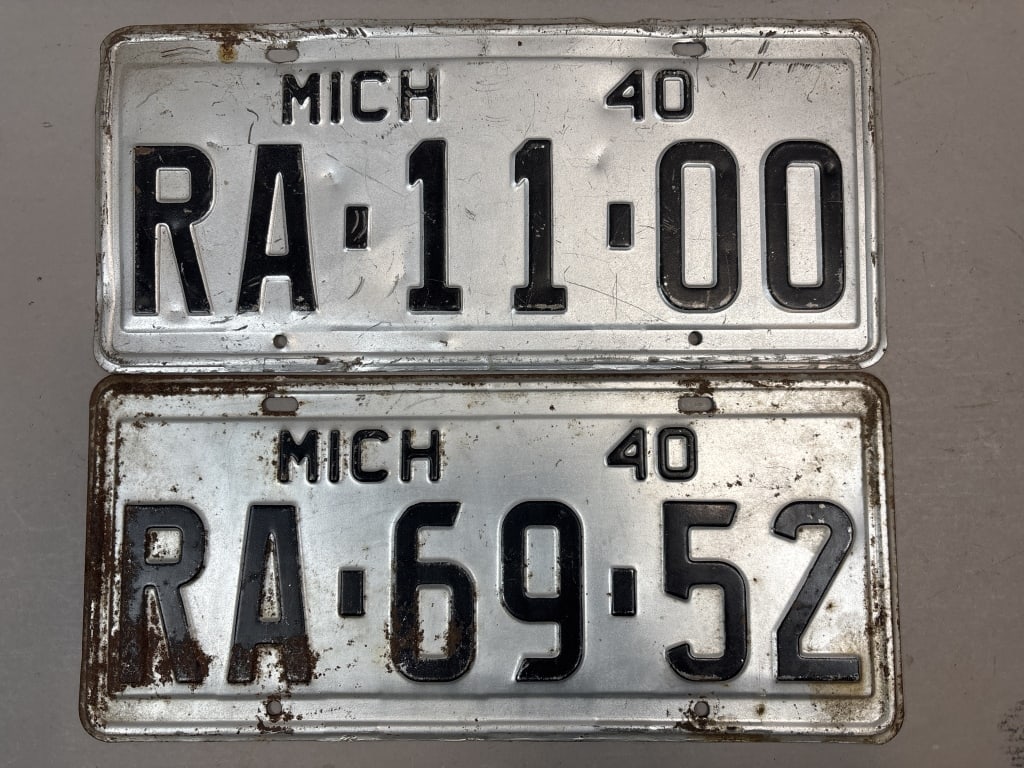 Pair 1940 Michigan RA1100 RA6952 License Plates: See all photos as a better idea of condition.