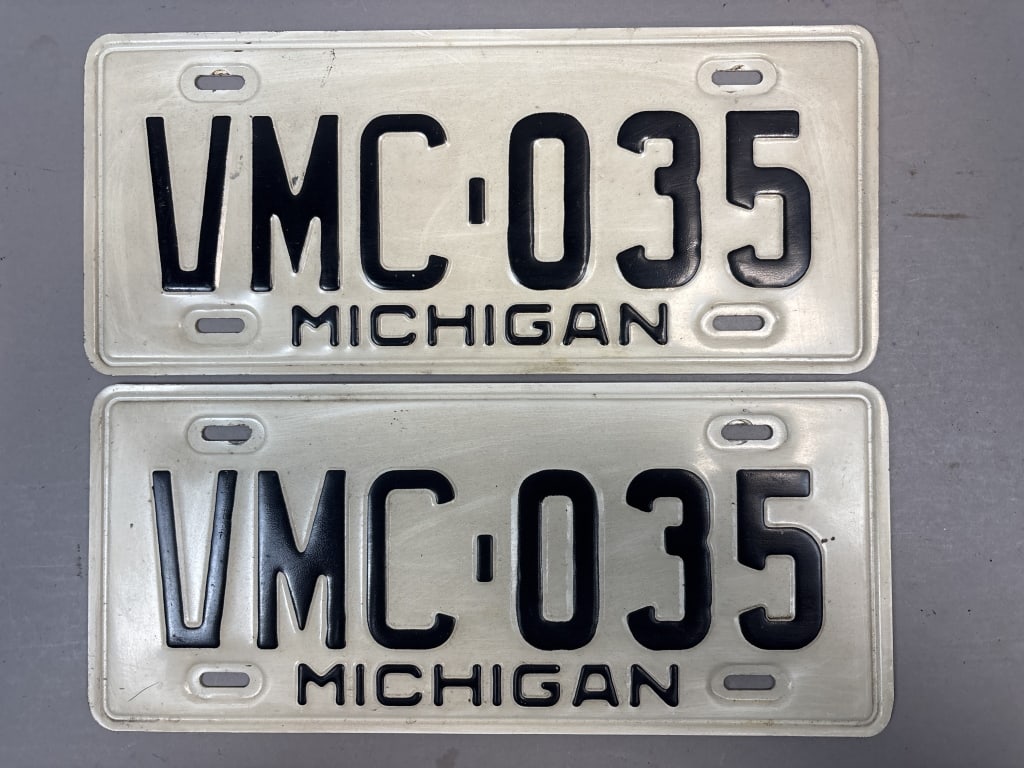 Pair Michigan VMC-035 Vintage License Plates: See all photos as a better idea of condition.