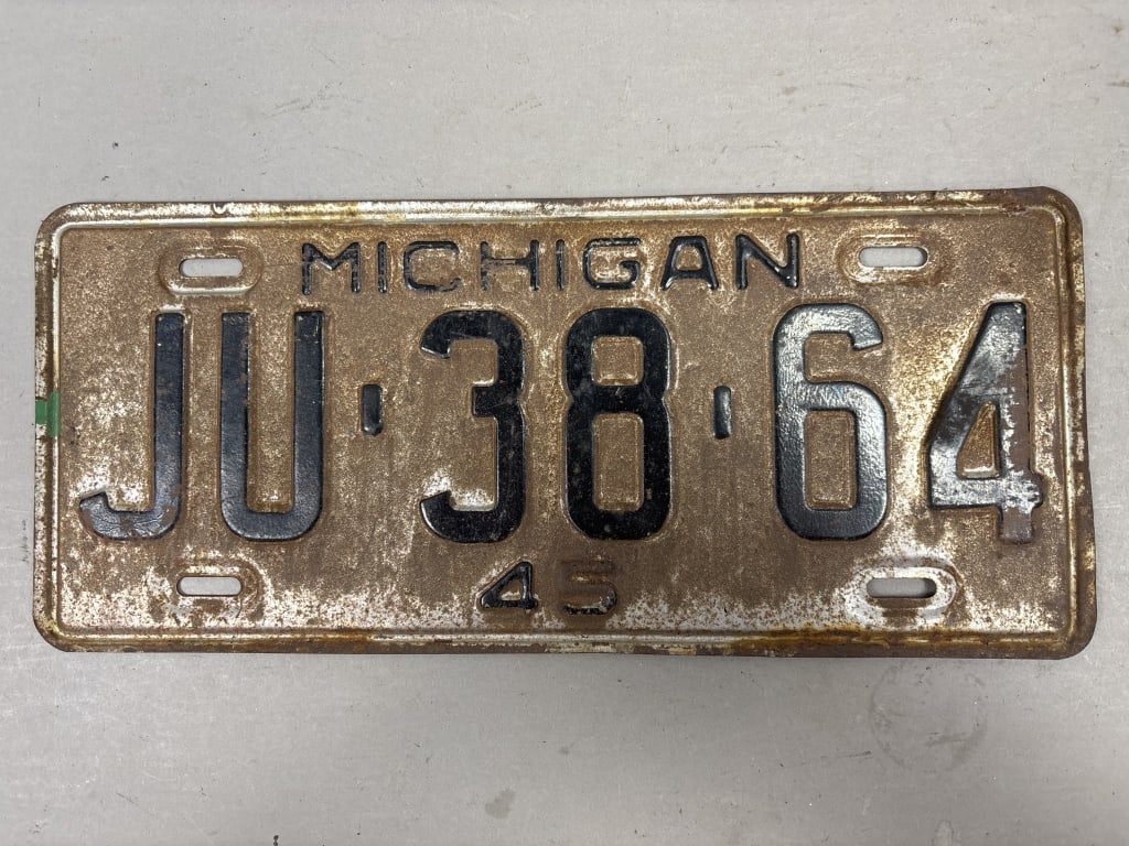 1945 Michigan JU-38-64 Vintage License Plate: See all photos as a better idea of condition.