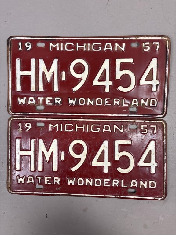 Pair of 1957 Michigan HM-9454 License Plates: See all photos as a better idea of condition.