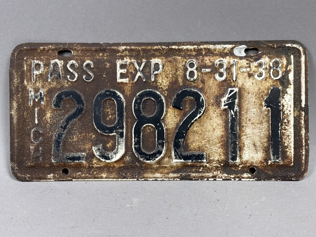 1938 Michigan 298211 Exp 8-31-38 License Plate: See all photos as a better idea of condition.