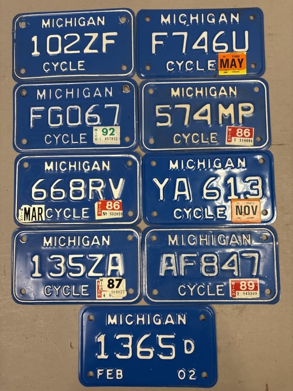 Lot of 9 Michigan Motorcycle License Plates: See all photos as a better idea of condition.