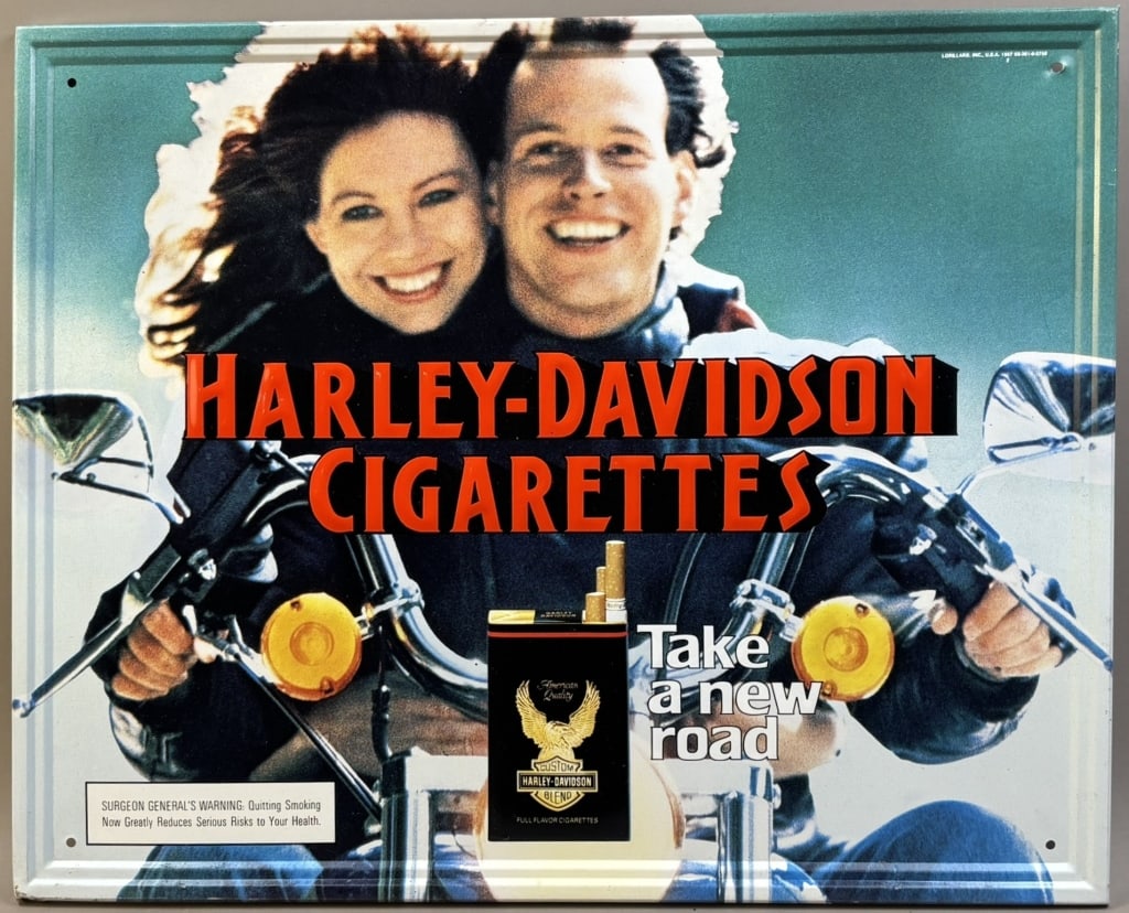 Harley Davidson Cigarettes SST Embossed Sign NOS: Dated 1987 - 21.5" x 17.5" - appears NOS with light surface wear. Paper still on the stickers.