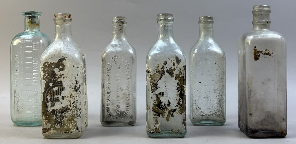 Antique Lot 6 Antique Embossed EMBALMING Bottles: See all photos.
