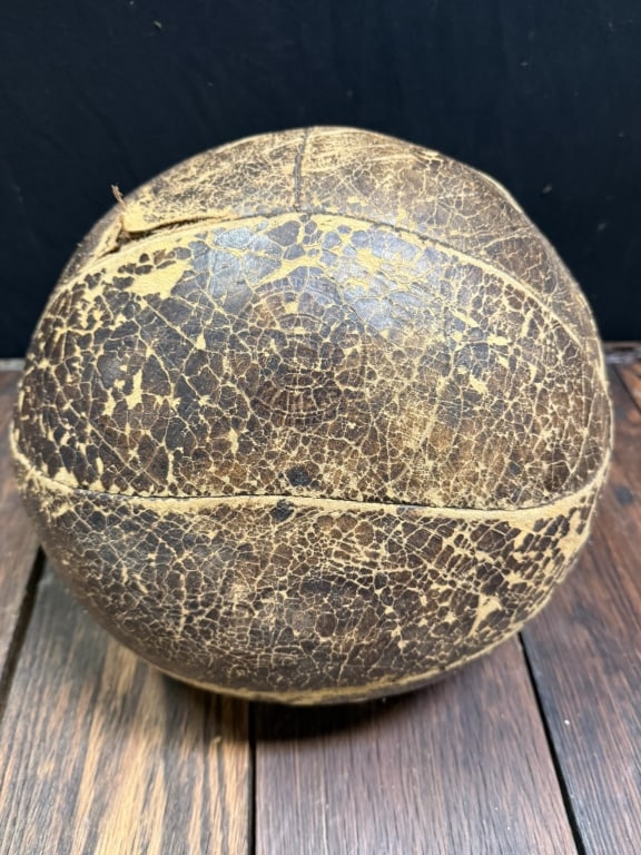 Antique1900s-20s 12" Reach Leather Medicine Ball: Great original surface. Wear and patina as shown with tear.