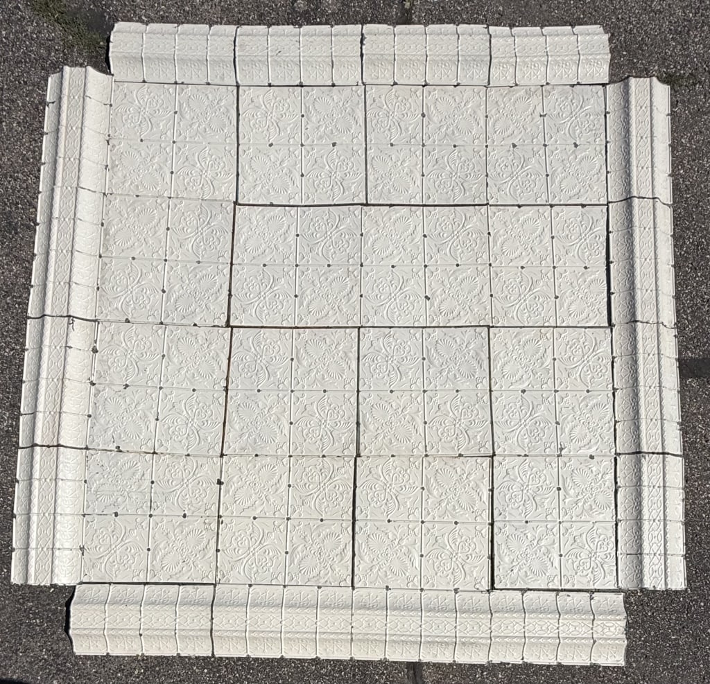 Antique Ornate Embossed 10?x10? Ceiling Tile: Victorian era, embossed ceiling tiles measuring roughly 10? x 10?. The squares measure 2? x 2? and the outer perimeter corners measure 12" x 2?! This came out of the Ann Arbor Michigan store circa