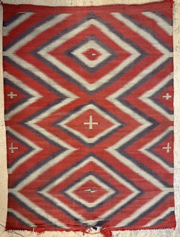 Antique Navajo Indian Saddle Blanket: 34.5 inches x 46.5 inches - obvious wear as shown. See all Indian blankets listed at auction.