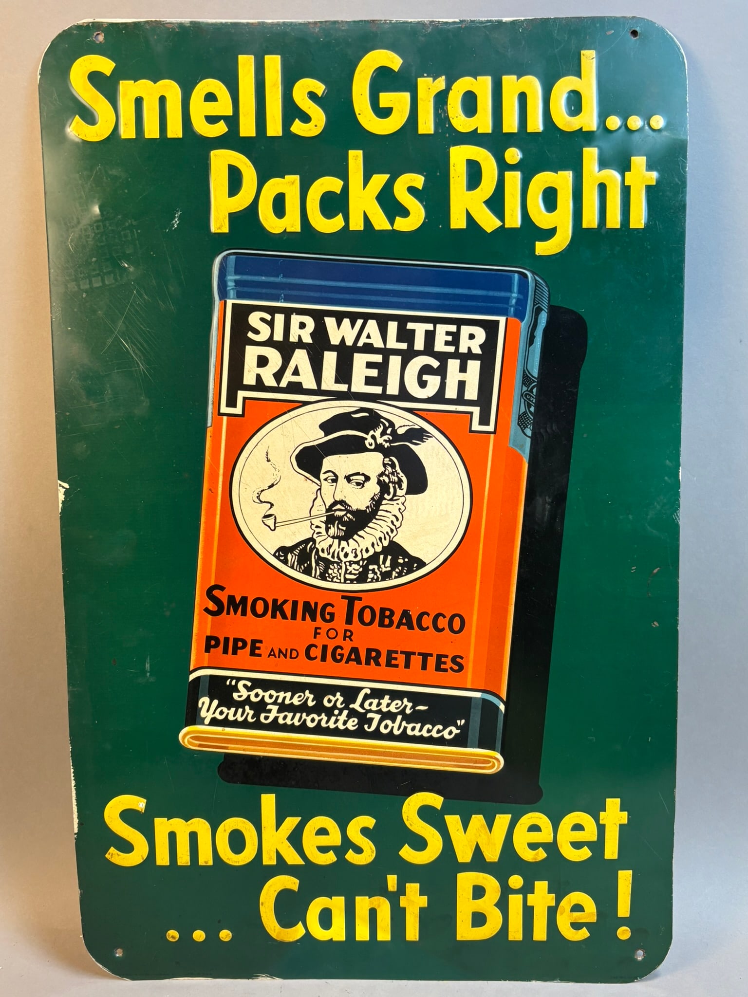 Sir Walter Raleigh Smells Grand Packs Right Single: 26" tall x 16.5" - great original painted metal sign in excellent condition. Circa 50s-60s. PLEASE NOTE WE OFFER IN HOUSE SHIPPING & HAVE BIDDING AVAILABLE ON OUR OWN WEBSITE! If you win on LIVE AUCTI