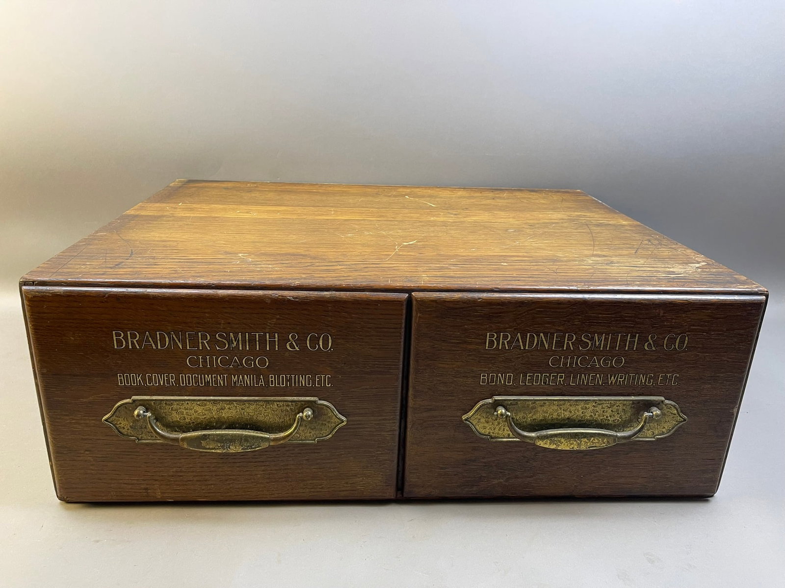 Bradner Smith & Co Chicago Library Wood File Box: Measurements in photos PLEASE NOTE WE OFFER IN HOUSE SHIPPING & HAVE BIDDING AVAILABLE ON OUR OWN WEBSITE! If you win on LIVE AUCTIONEERS, please click "SELF ARRANGED SHIPPING" and keep on the