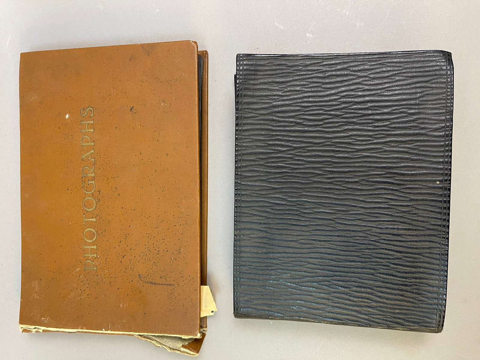Pair of Vintage Photo Albums/Books w/ Family Photo: Measurements in photos PLEASE NOTE WE OFFER IN HOUSE SHIPPING & HAVE BIDDING AVAILABLE ON OUR OWN WEBSITE! If you win on LIVE AUCTIONEERS, please click "SELF ARRANGED SHIPPING" and keep on the lookout
