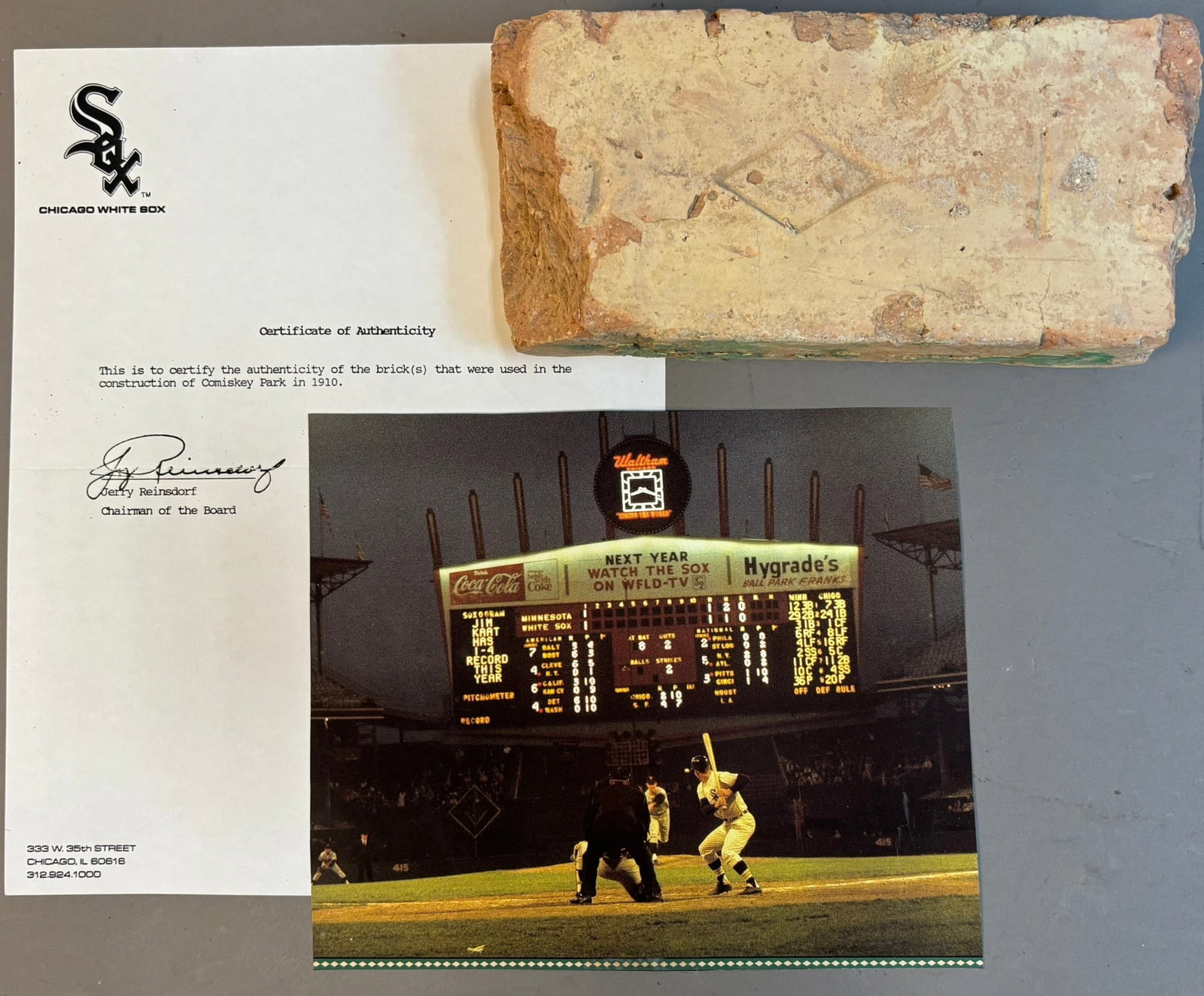 Chicago White Sox Comiskey Park Stadium Brick COA: Jerry Reinsdorf Chairman Of The Board signed COA.