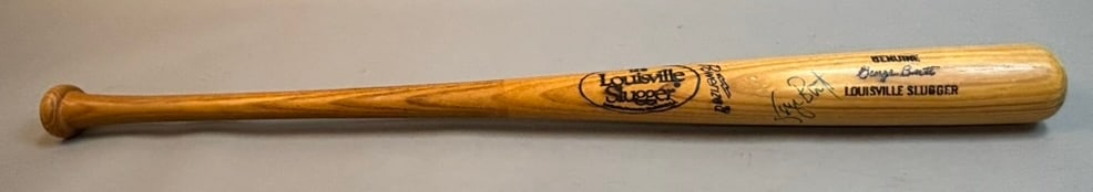 George Brett Louisville Sluger Signed Store Bat: Great original store model bat. 33.5" and 32.3 oz. Beckett auth number is BY065091