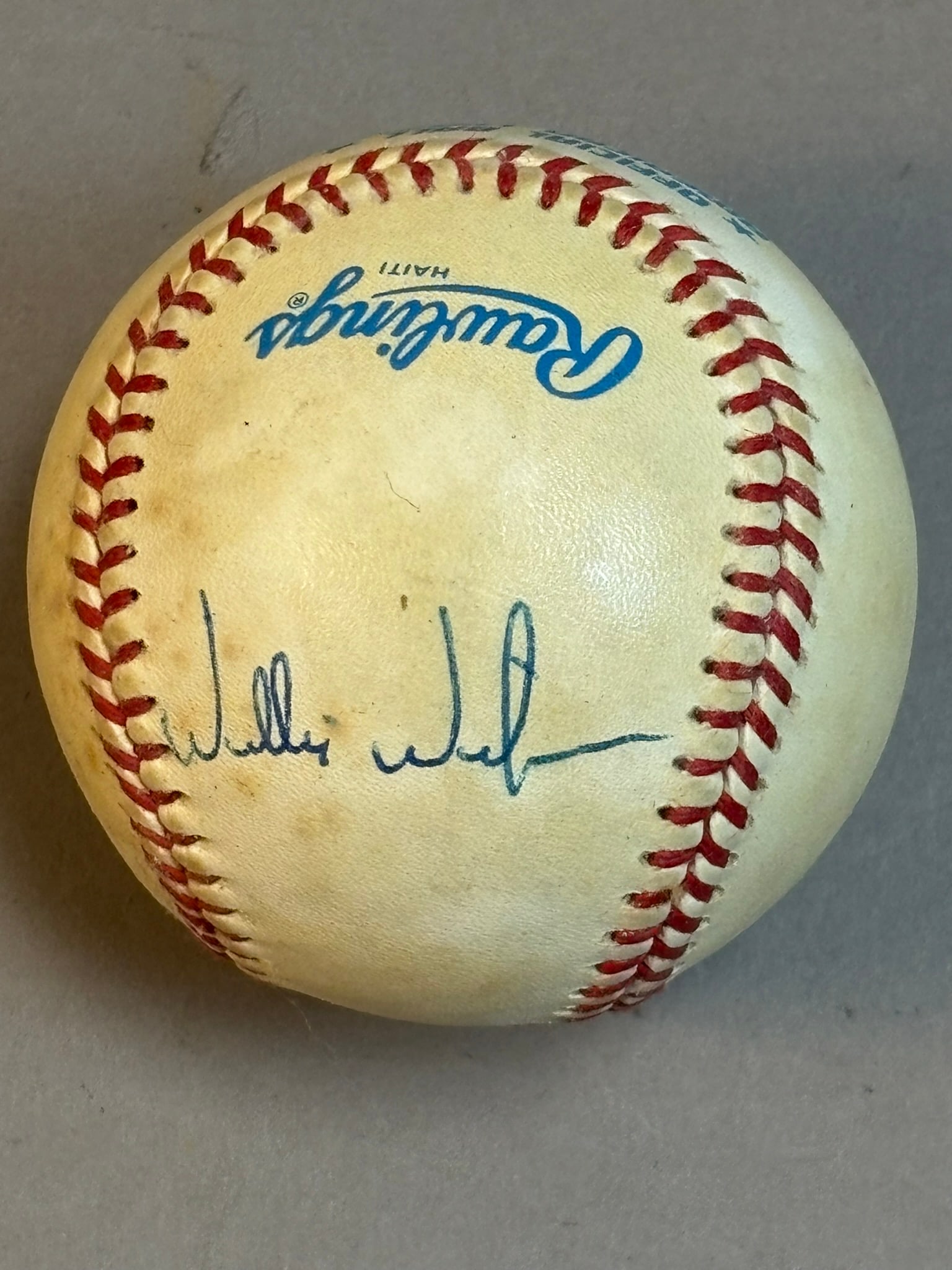 Willie Wilson Single Signed Rawlings Brown Ball: PLEASE SEE ALL PHOTOS AND USE THEM AS A BETTER IDEA ON DESCRIPTION! ASK ANY QUESTIONS! PLEASE NOTE WE OFFER IN HOUSE SHIPPING & HAVE BIDDING AVAILABLE ON OUR OWN WEBSITE! If you win on LIVE