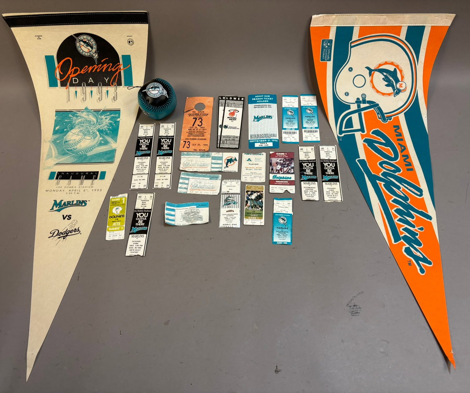 Lot 23 Florida Marlins Miami Dolphins Pennants: PLEASE SEE ALL PHOTOS AND USE THEM AS A BETTER IDEA ON DESCRIPTION! ASK ANY QUESTIONS! PLEASE NOTE WE OFFER IN HOUSE SHIPPING & HAVE BIDDING AVAILABLE ON OUR OWN WEBSITE! If you win on LIVE