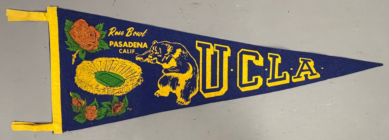 UCLA Rose Bowl Pasadena California Felt Pennant: PLEASE SEE ALL PHOTOS AND USE THEM AS A BETTER IDEA ON DESCRIPTION! ASK ANY QUESTIONS! PLEASE NOTE WE OFFER IN HOUSE SHIPPING & HAVE BIDDING AVAILABLE ON OUR OWN WEBSITE! If you win on LIVE