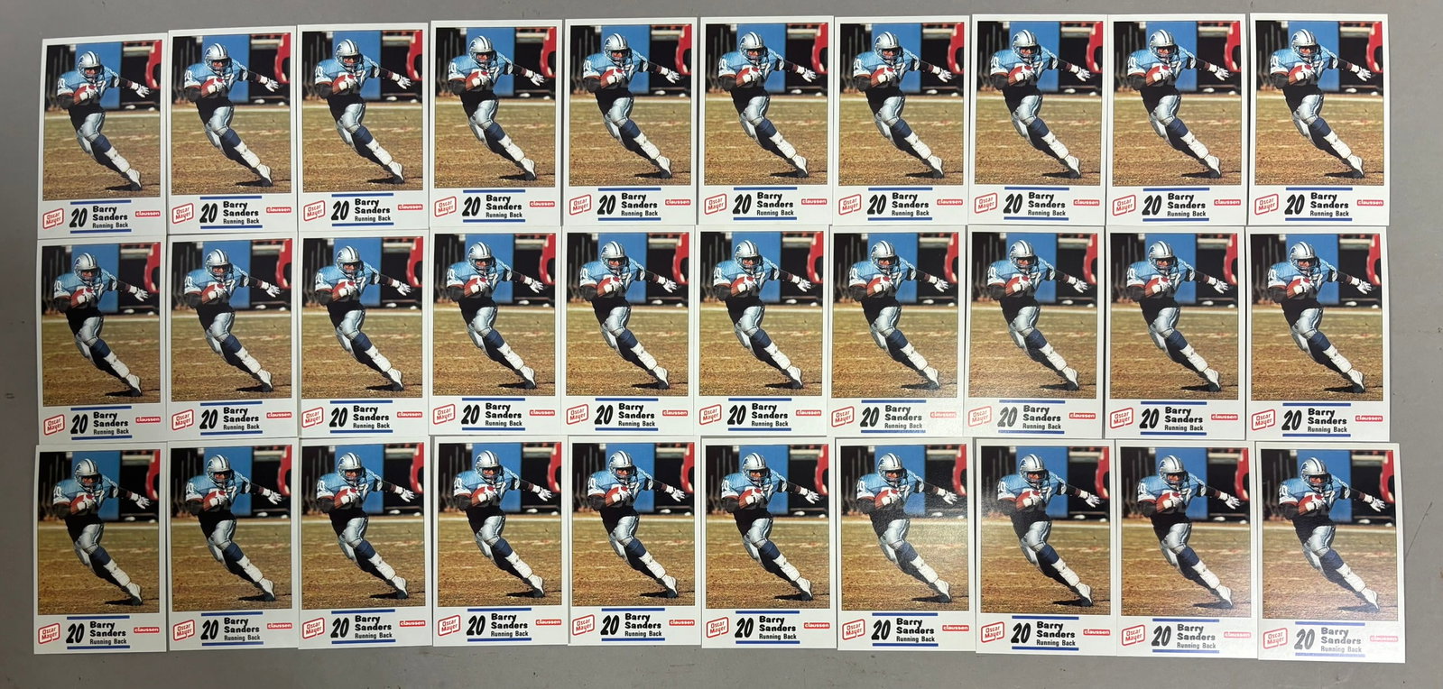 Lot 30 Barry Sanders Oscar Meyer Football Cards: PLEASE SEE ALL PHOTOS AND USE THEM AS A BETTER IDEA ON DESCRIPTION! ASK ANY QUESTIONS! PLEASE NOTE WE OFFER IN HOUSE SHIPPING & HAVE BIDDING AVAILABLE ON OUR OWN WEBSITE! If you win on LIVE AUCTIONEER