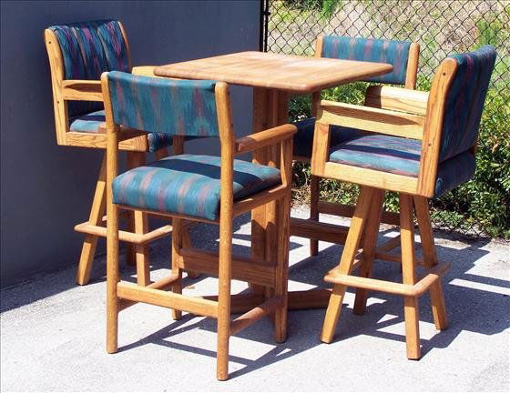 Table and 4 Chairs: Table and 4 Chairs - aqua cushions 2 swivel chairs & 2 regular bar height -Oak