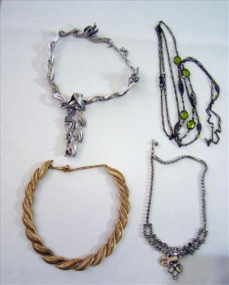 4 necklaces: 4 necklaces 2 Trifari gold and silver tone - Rhinestone marked Kramer - 60" green stone pearl on gold stone chain