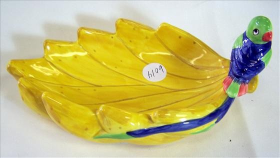 Fitz and Floyd dish: Fitz and Floyd Hand painted parrot on banana dish 9 1/2"