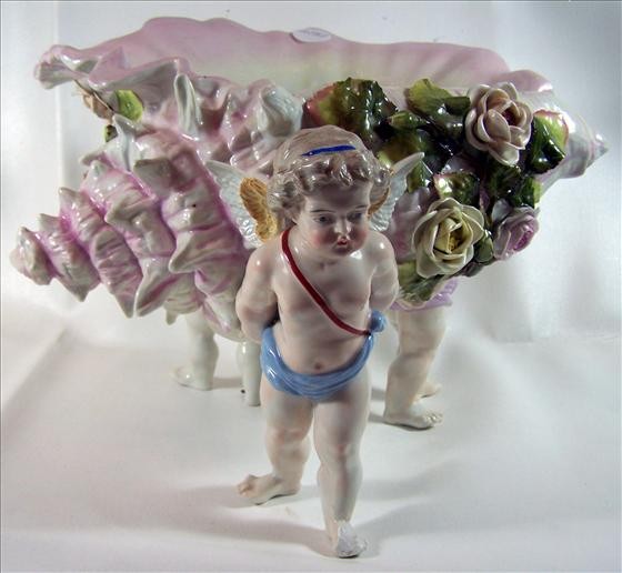 Porcelain cupids holding up shell: Porcelain cupids holding up shell some chips - blue mark - 3 lines 1 vertical 2 horizontal? - 13" x 9" large piece