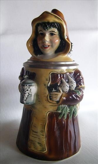 German stein - blue crown & shield mark: German stein - blue crown and shield mark - hooded nun with mug - HB - and vegetables 9"