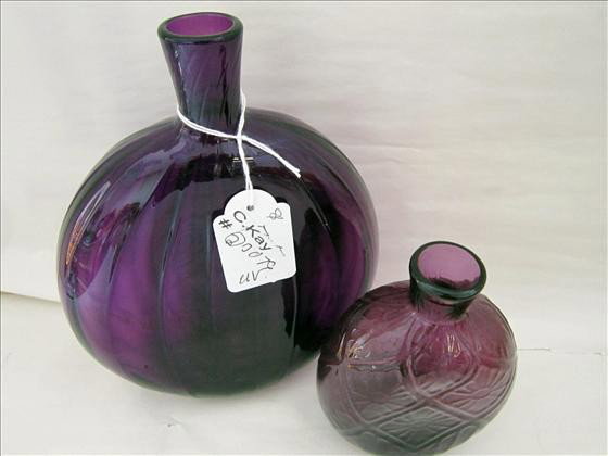 2 pc - Modern Pairpoint purple bottles: 2 pc - Modern Pairpoint purple glass bottles - marked - 5 1/2 and 8 inch - ribbed and flowered designs
