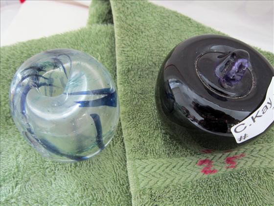 2 paper weights: 2 paper weights one purple apple and other blue swirl pen holder - 2 1/2 to 3"