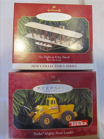 2 Hallmark keepsake ornaments: 2 Hallmark keepsake ornaments - The flight at Kitty Hawk Tonka Mighty Front Loader