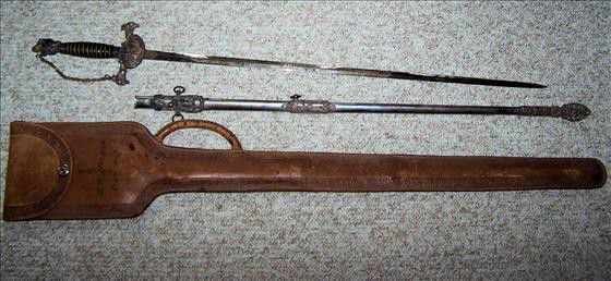 Knights of Pythias Fraternal Sword: Knights of Pythias Fraternal Sword & Scabbard. This is a highly decorated sword with Scabbard and Leather case. The Pythians was the first Fraternal Origination chartered by the US Congress on Feb. 19