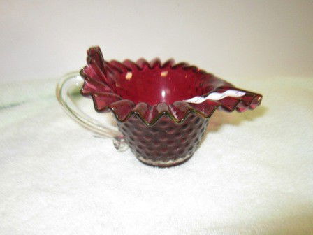 Murano cranberry hobnail candy dish: Murano glass cranberry hobnail candy dish with clear handle and ruffled top6 by 4